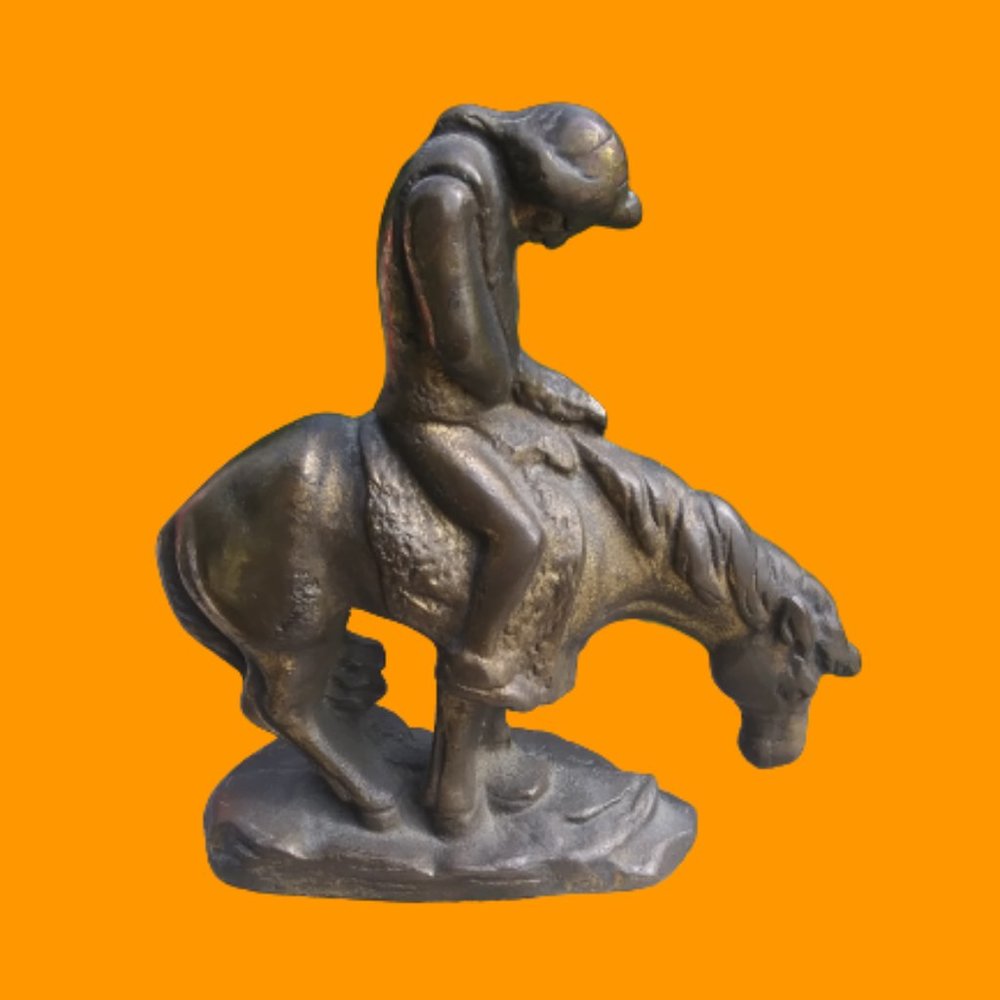 Very solid heavy metal bookend End of Trail horse and rider